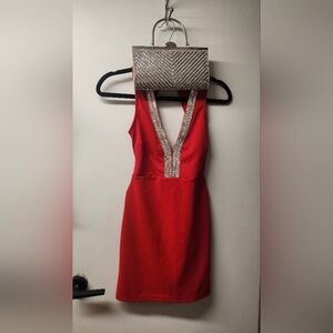 Elegant Red Sleeveless Dress with Silver Accents